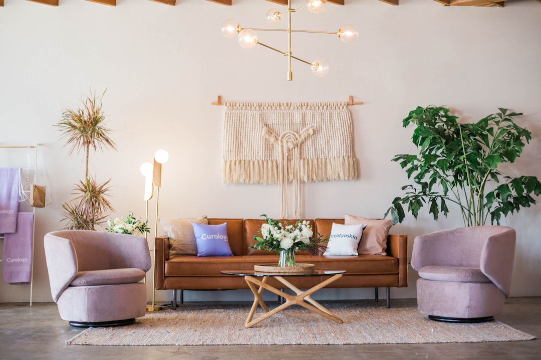 brown-leather-sofa-and-two-pink-sofa-chair-6cjg-fotys4