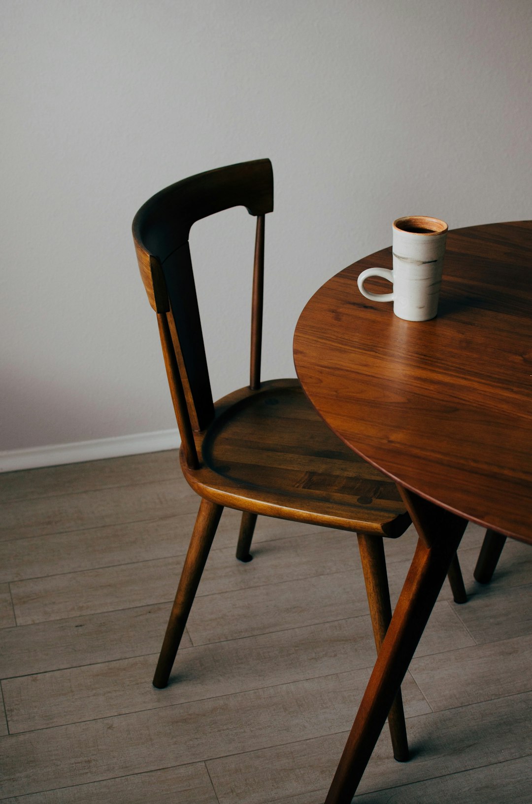 white-ceramic-mug-on-brown-wooden-table-9v7ujs92hyc